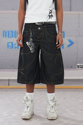 Deconstructed Bat-Shaped Raw Denim Jeans