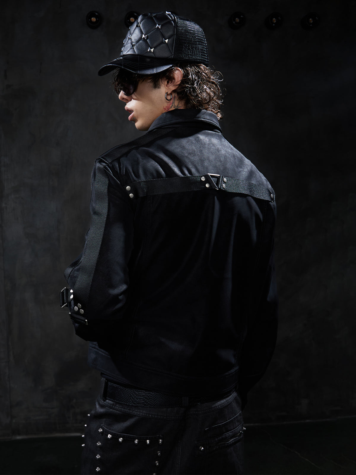 Dark Studded Multi-Strap Suede Jacket