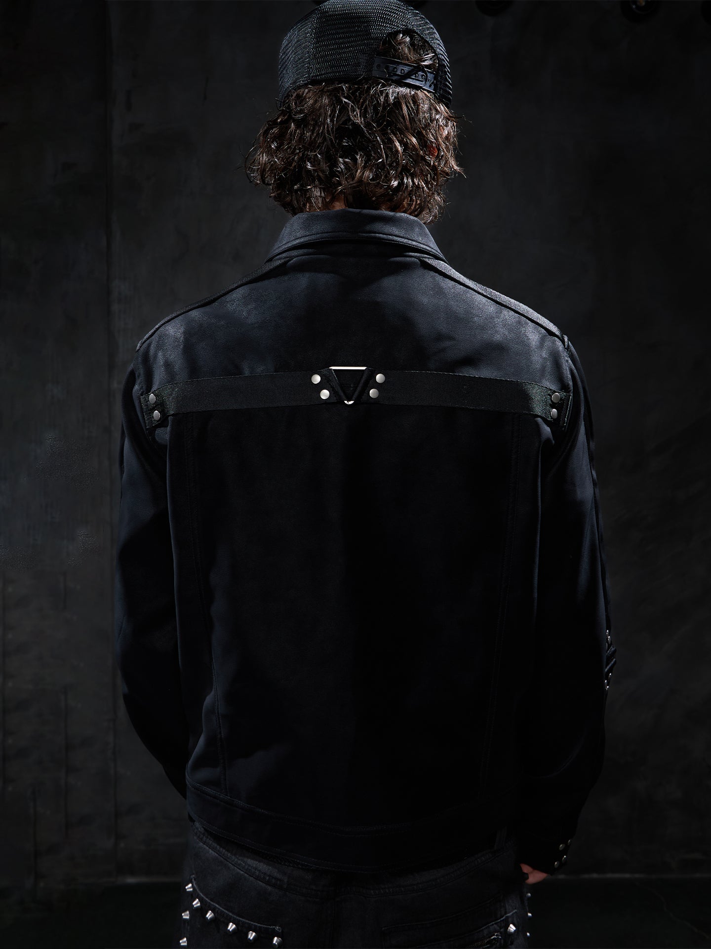 Dark Studded Multi-Strap Suede Jacket
