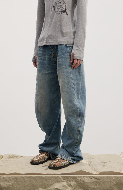Curved Button Fly Loose Fit Washed Denim