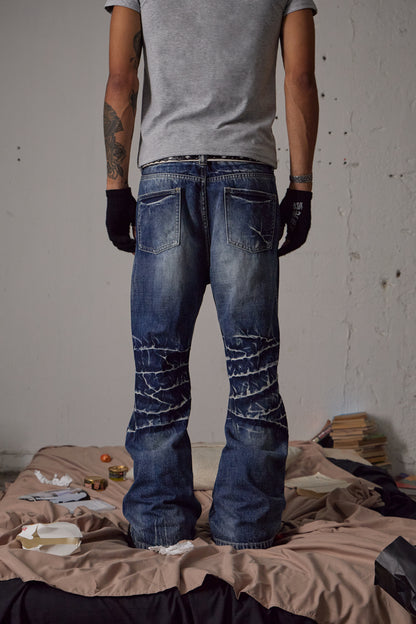 Knee Crease Washed Flared Jeans
