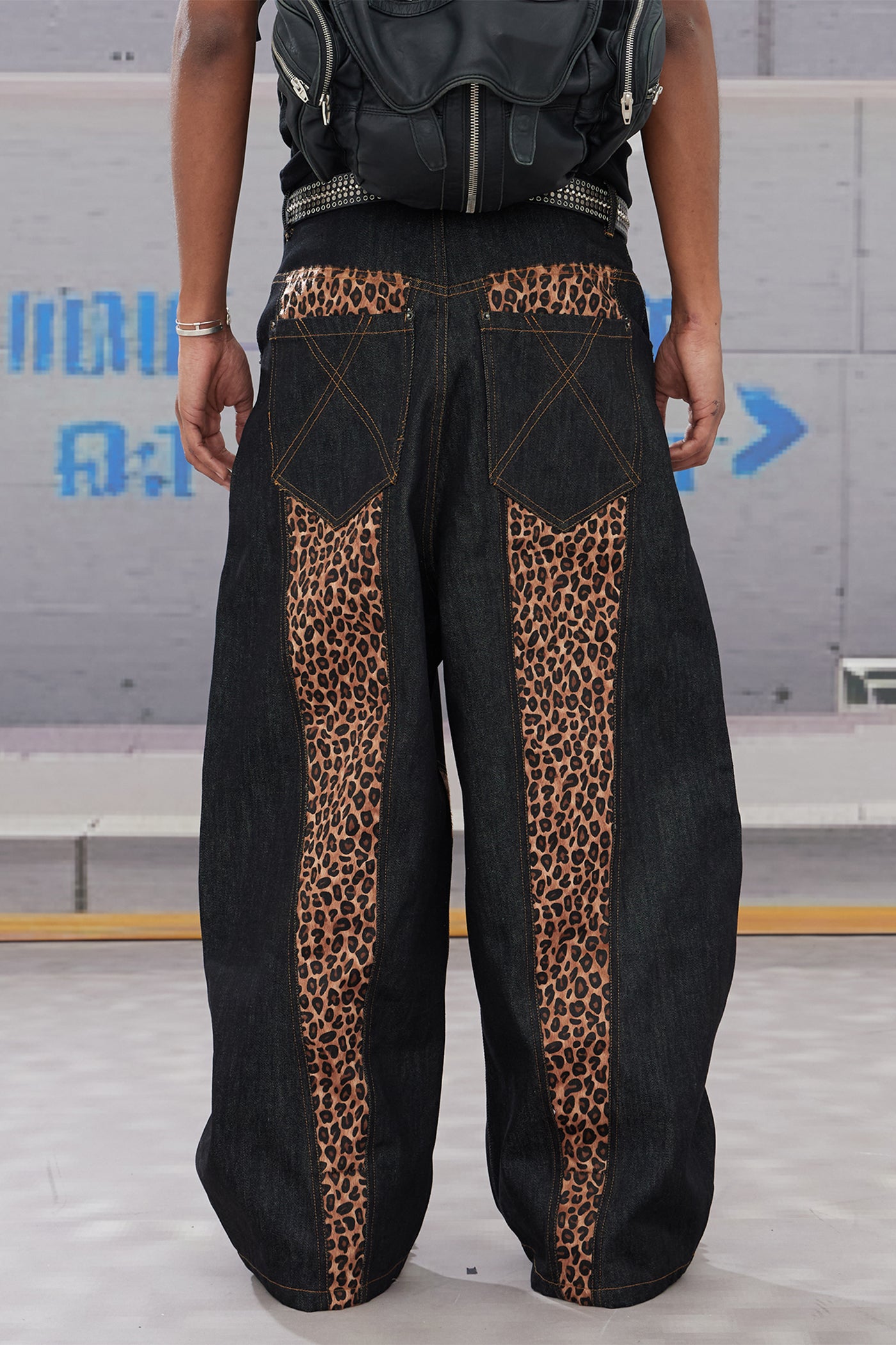 Cross-Paneled Genuine Haircalf Leopard Leather Curved Baggy Jeans