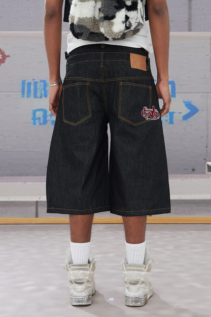 Deconstructed Bat-Shaped Raw Denim Jeans
