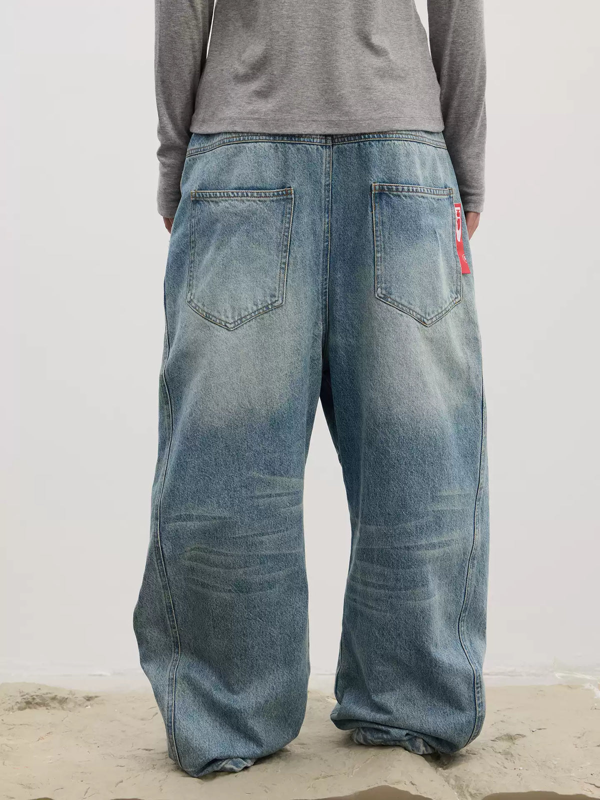 Asymmetrical Long Button Fly Curved-Blade Denim